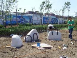 hj1736 石雕—箱包_青島國(guó)際服裝城不銹鋼雕塑、石雕、玻璃鋼雕塑_濱州宏景雕塑有限公司